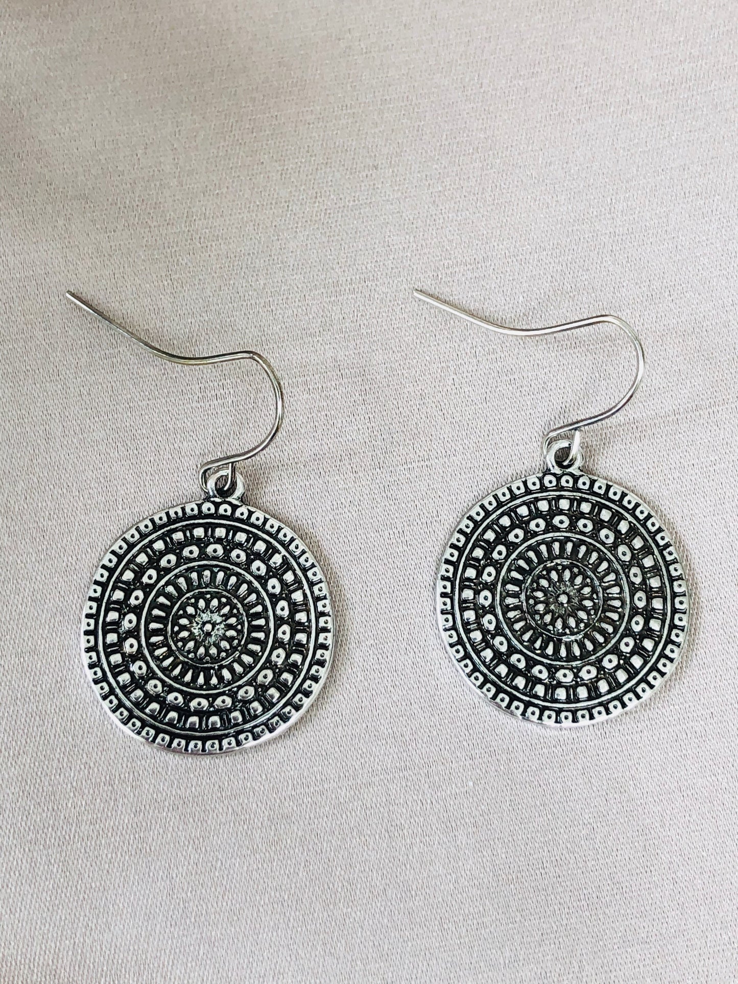 Intricate Silver Discs