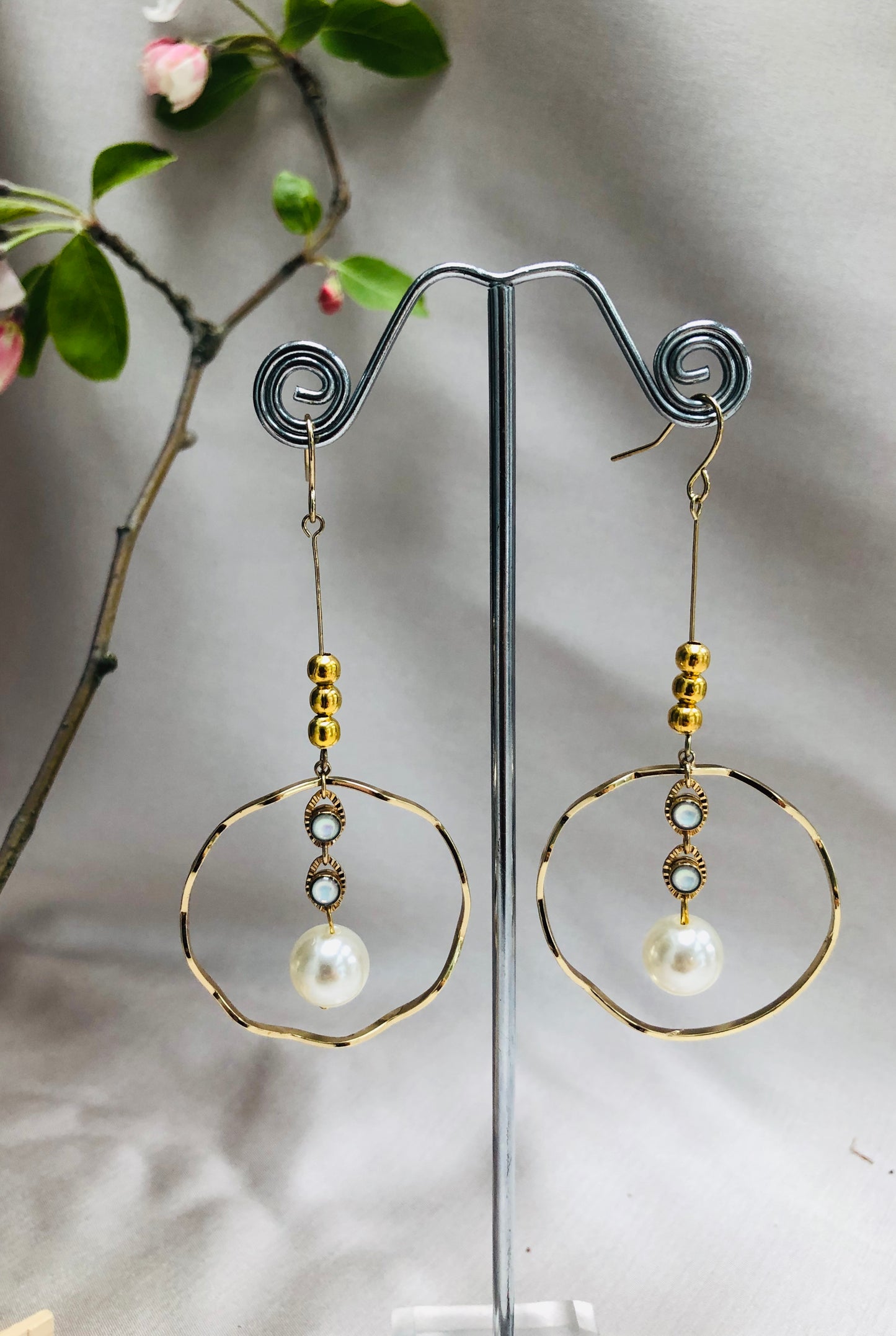 Golden Ring with Suspended Pearl