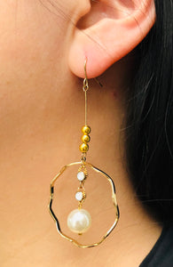 Golden Ring with Suspended Pearl