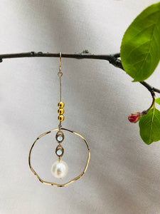 Golden Ring with Suspended Pearl