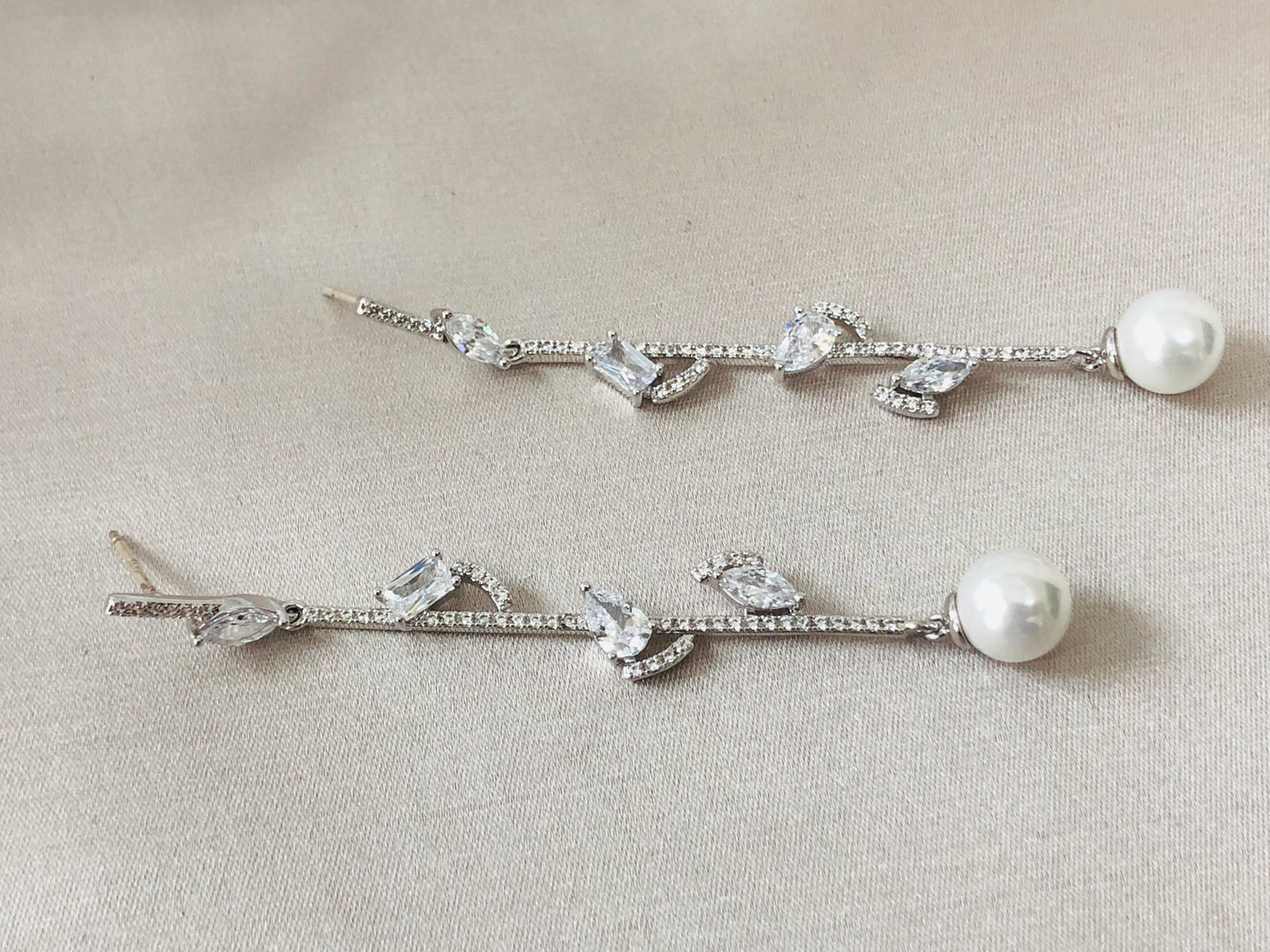 Elegant Dangling Pearl