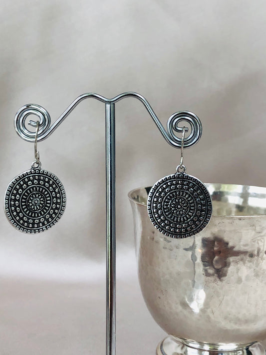 Intricate Silver Discs